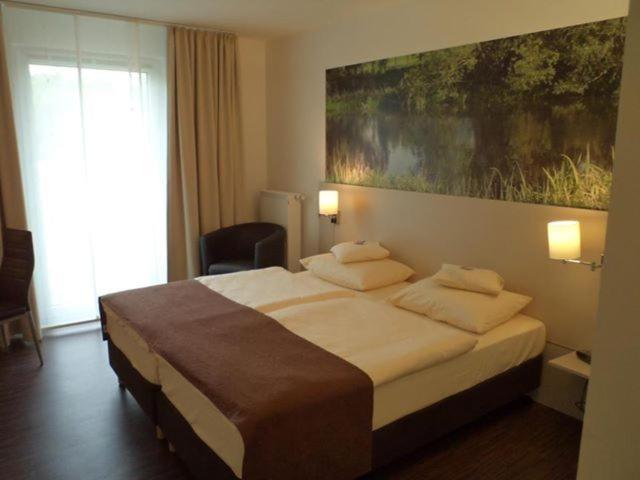 Das Neue Hotel Am Park Фрёнденберг Номер фото